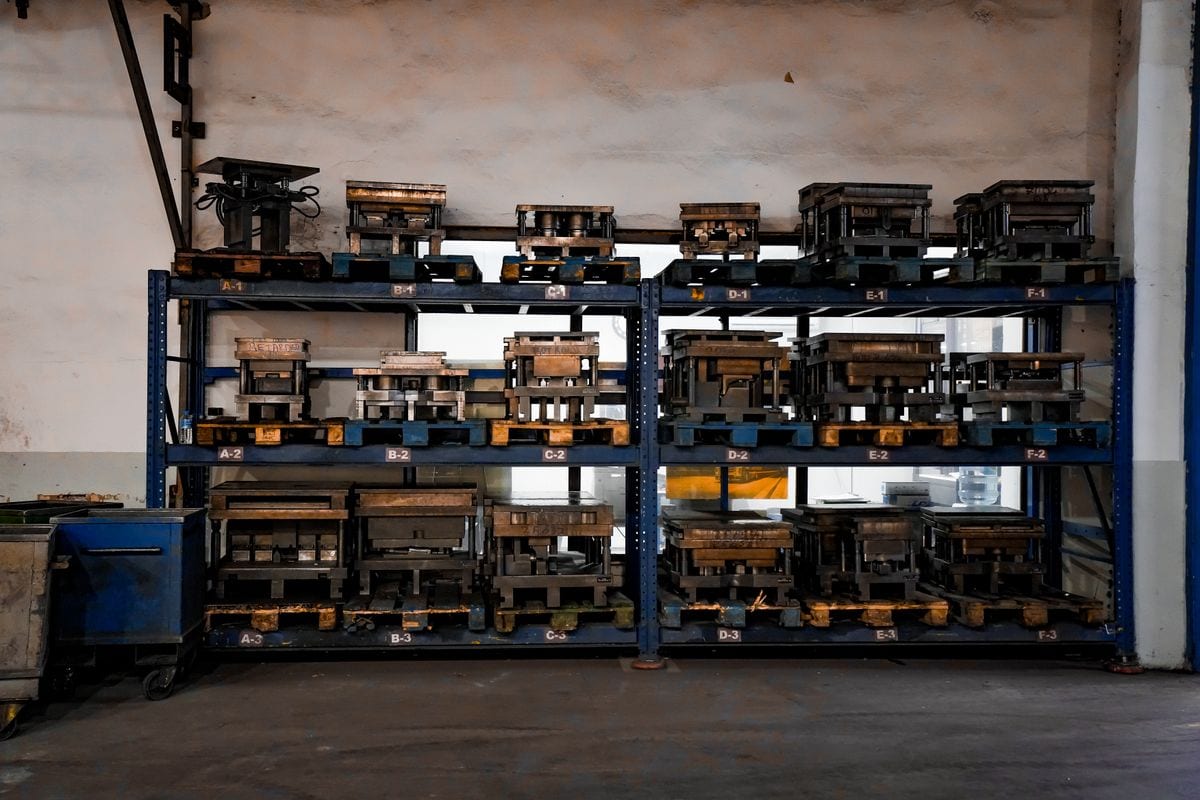 Gege Mould manufacturing facility interior — additional workshop angle showing mold tooling workstations and production layout